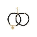 PULSERA ANNE KLEIN HOLIDAY HEARTS NEGRO