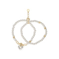 PULSERA ANNE KLEIN HOLIDAY HEARTS BITONO