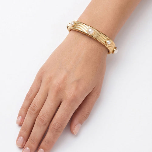 PULSERA ANNE KLEIN COLOR DORADO FORMA ASIMETRICO 01B01416
