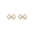ARETES ANNE KLEIN GLIMMERING EARS DORADO