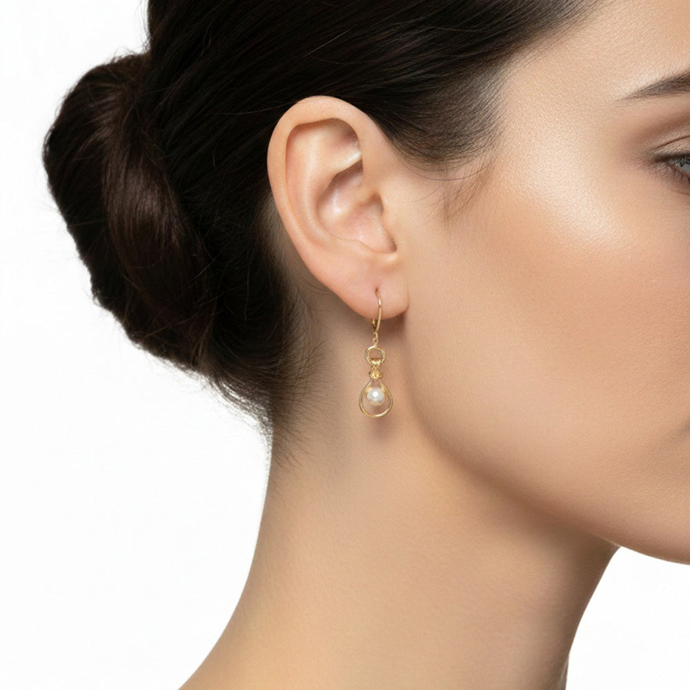 ARETES ANNE KLEIN COLOR DORADO LARGOS 01G01580