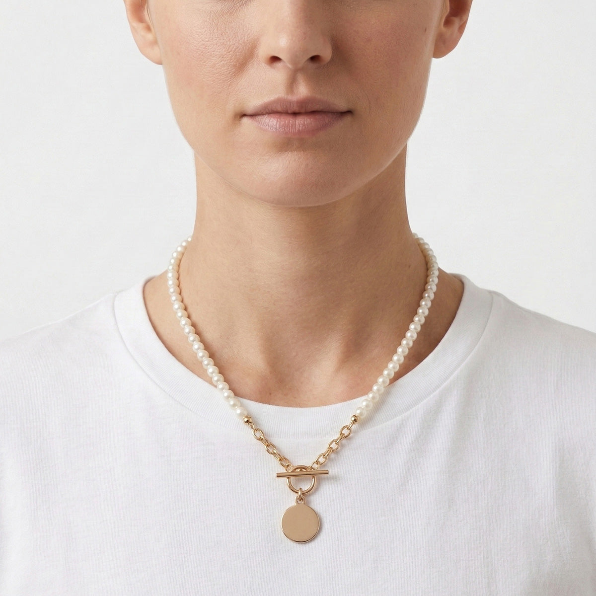 COLLAR ANNE KLEIN  COLOR DORADO FORMA CIRCULAR  01N00277