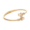 PULSERA COLOR DORADO, GIVENCHY, FORMA HOJA TIPO RÃGIDA DE CRISTALES COLOR TRANSPARENTE, CIERRE TIPO SIN FIJACIÃ“N, FAMILIA CRYSTALIZED GARDEN, CONTENIDO 1 PULSERA