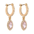 ARETES COLOR DORADO, GIVENCHY, FORMA OVALADA TIPO HUGGIES DE CRISTALES COLOR VIOLETA, CIERRE TIPO GANCHO FRANCÃ‰S, FAMILIA SWEET ESCAPE, CONTENIDO 1 PAR DE ARETES