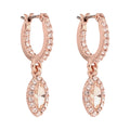 ARETES COLOR ORO ROSA, GIVENCHY, FORMA OVALADA TIPO HUGGIES DE CRISTALES COLOR ROSA, CIERRE TIPO GANCHO FRANCÃ‰S, FAMILIA SWEET ESCAPE, CONTENIDO 1 PAR DE ARETES