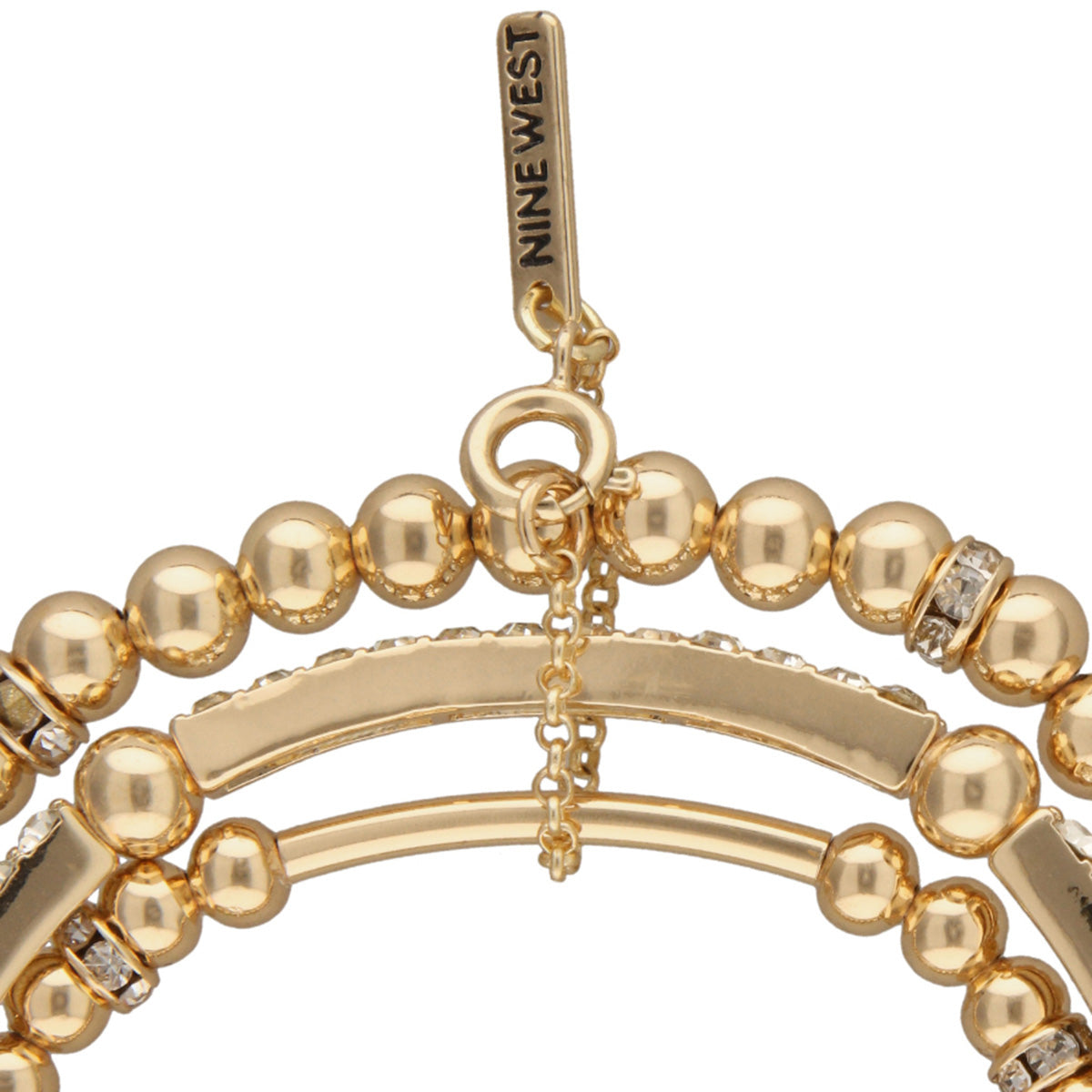 PULSERA NINE WEST STRIPED PAVE DORADO