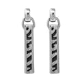 ARETES NINE WEST ANIMAL INSTINCT PLATA