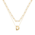 COLLAR NINE WEST PUFFY INITIAL DORADO