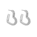 ARETES COACH 9.1 BOWTIQUE PLATEADO