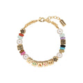 PULSERA COACH COLOR dorado FORMA LETRAS 37527571GLD966