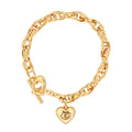 PULSERA COACH 11.1 BRUSHED CHARMING CHARMS DORADA