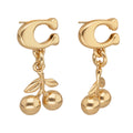 Aretes Coach Dorado Familia 4.1 Charms Cerezas   Dorado